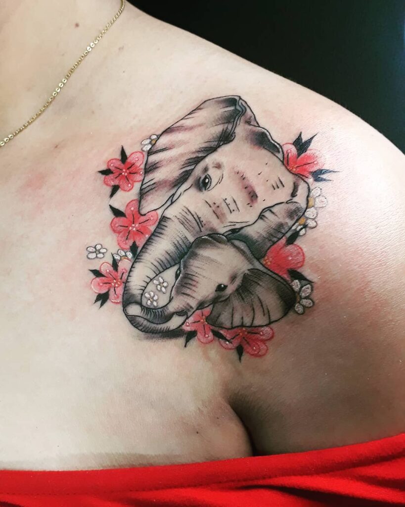 elephant holding flower tattooTikTok Search