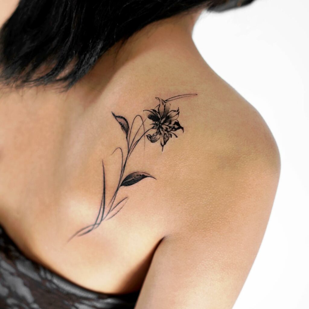Flower back tattoo......continued....arm...now coloured!