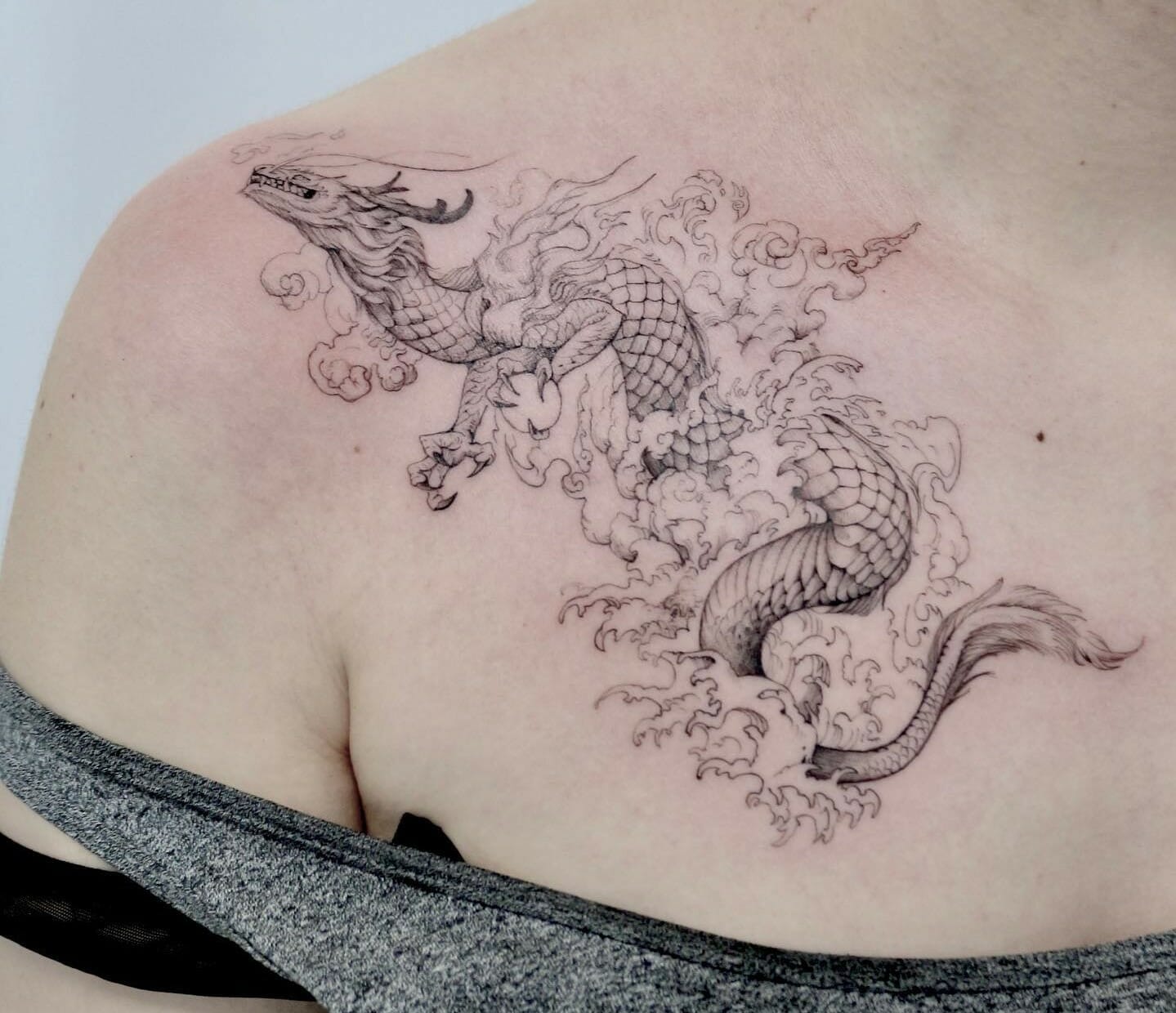 Womens feminine dragon tattoo