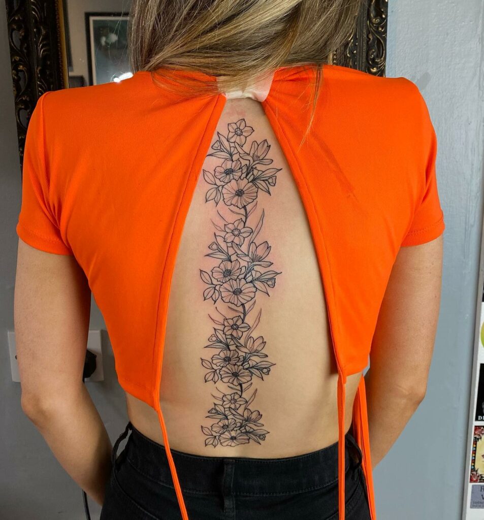 Feminine Spine Tattoo Flower