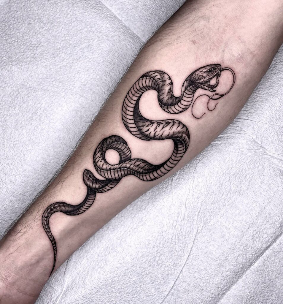 Fierce And Venomous Snake Tattoo On The Wrist