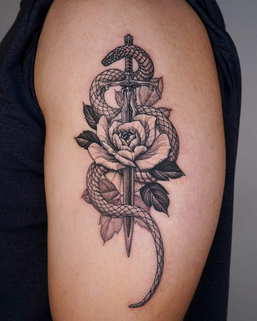 Fierce Sword And Snake Flower Tattoo Design
