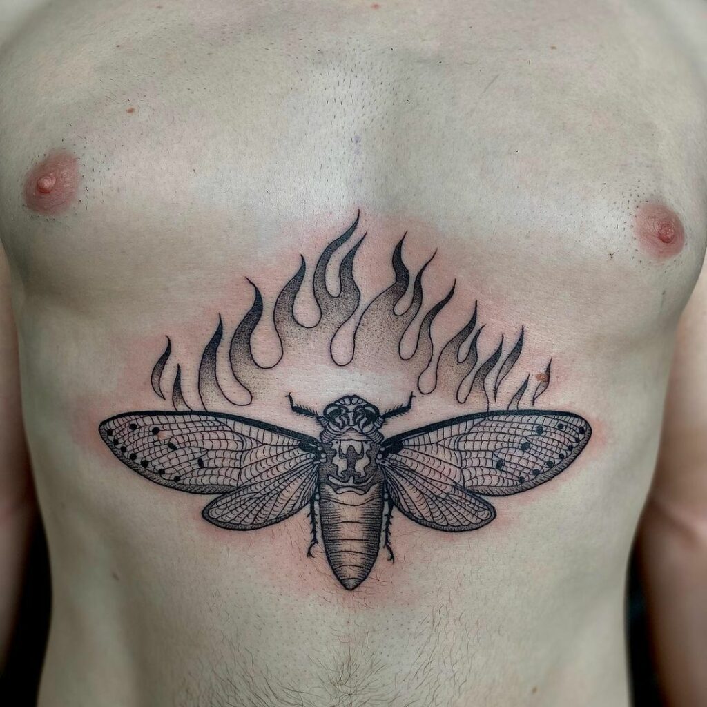 Fiery Cicada Chest Tattoo