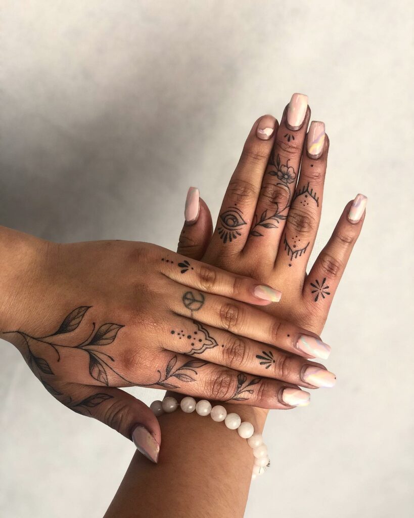 Fine Line Finger Tattoo