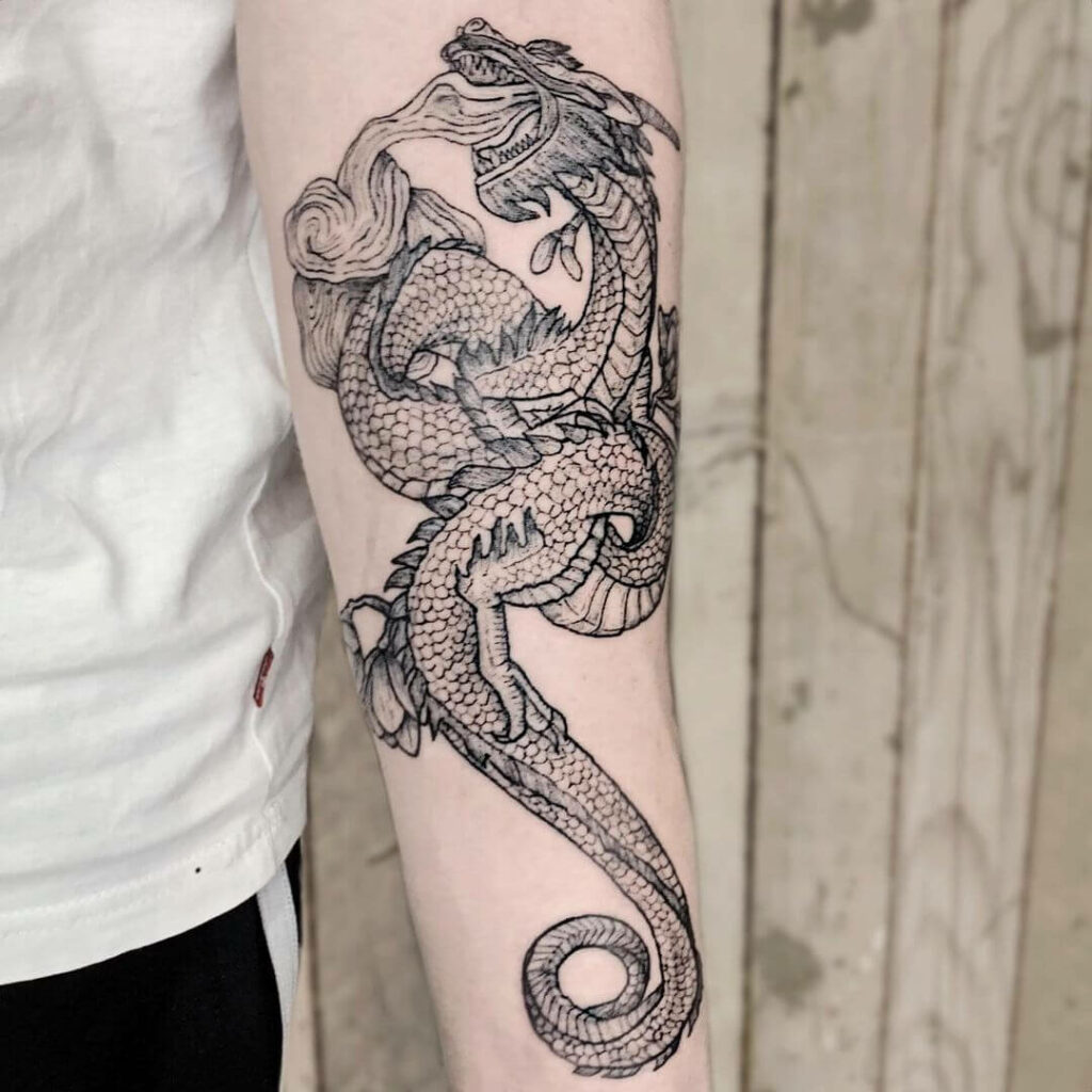 dragon tattoo on arm 23012020 013 dragon tattoo tattoovaluenet   tattoovaluenet