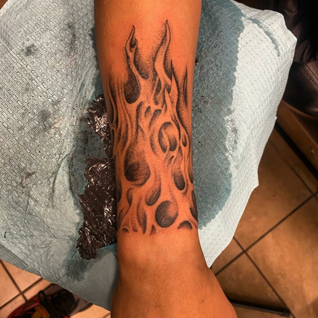 13 Fire And Flame Tattoos On Forearm