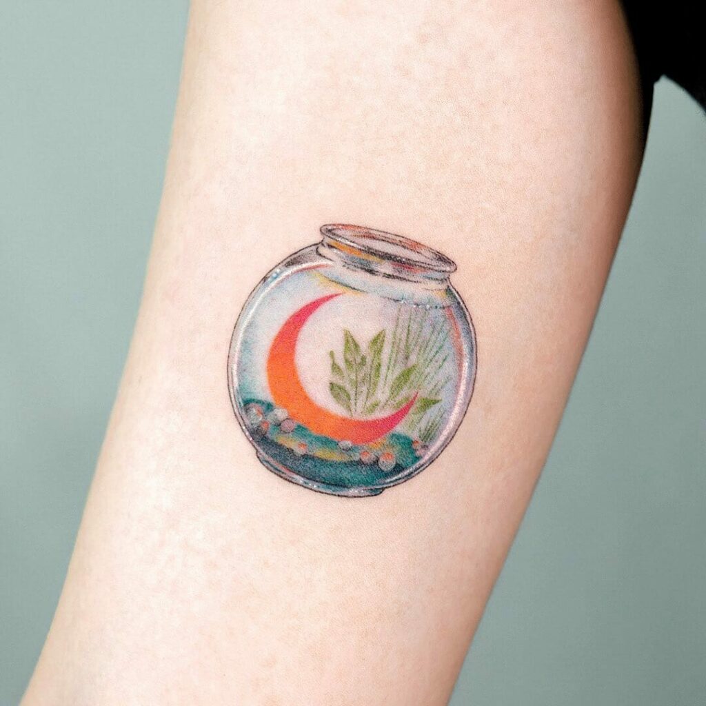 Fish Bowl Hand Tattoo