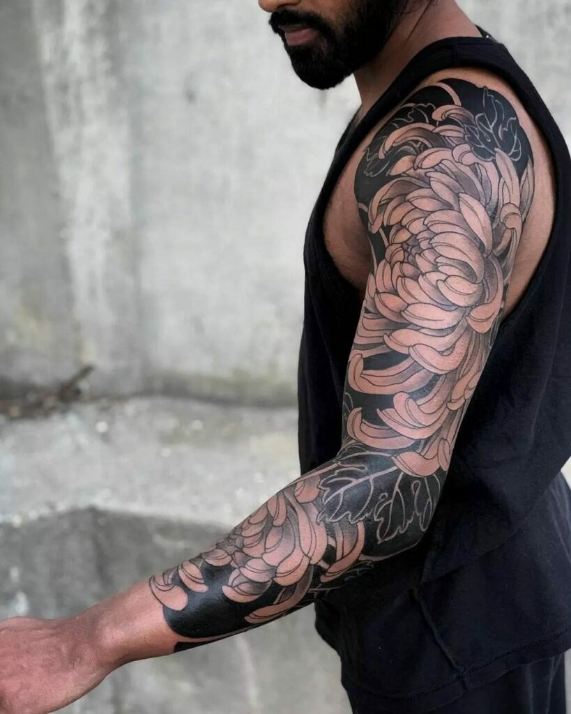 11 Brown Skin Tattoo Ideas That Will Blow Your Mind   Floral Tattoo On Dark Skin 819x1024 