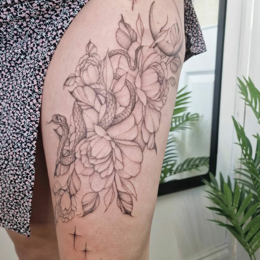 Flower And Snake Thigh Tattoo