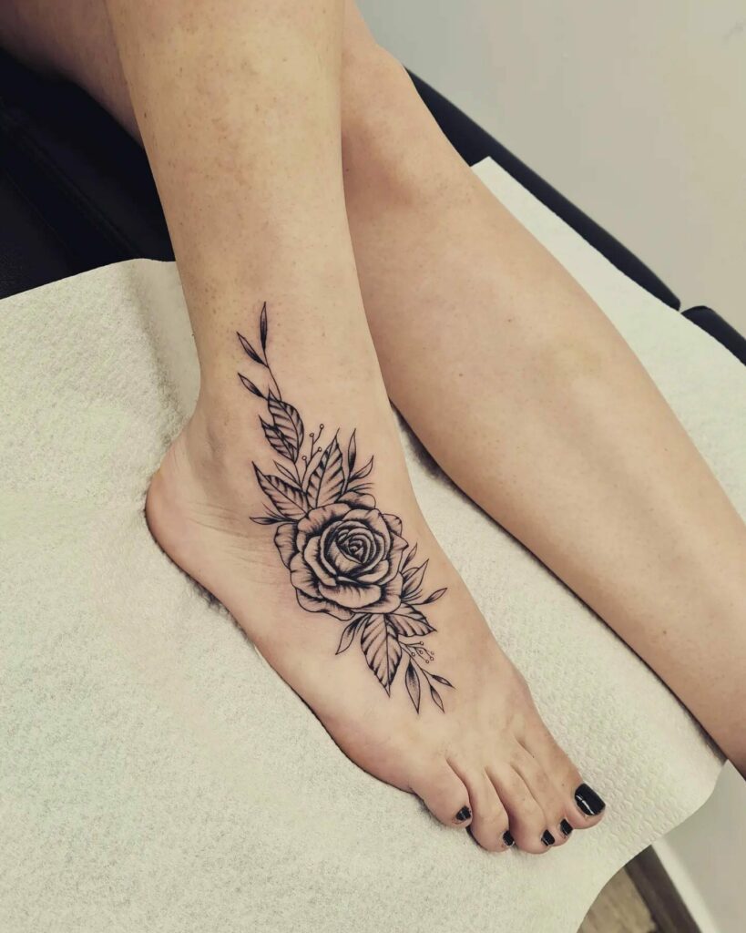 Flower foot tattoo by Derek Poitra: TattooNOW