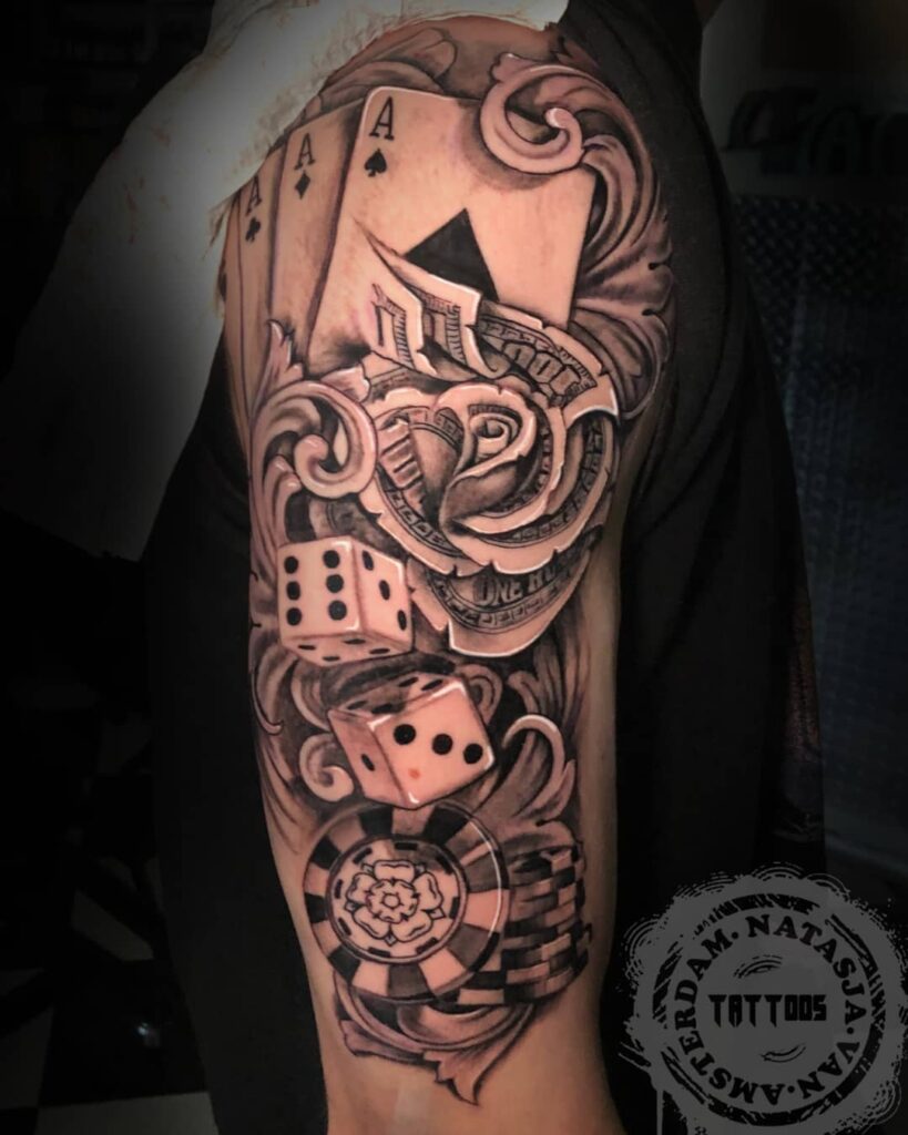 Red Stars And Cards Dice Tattoo On Left Back Shoulder