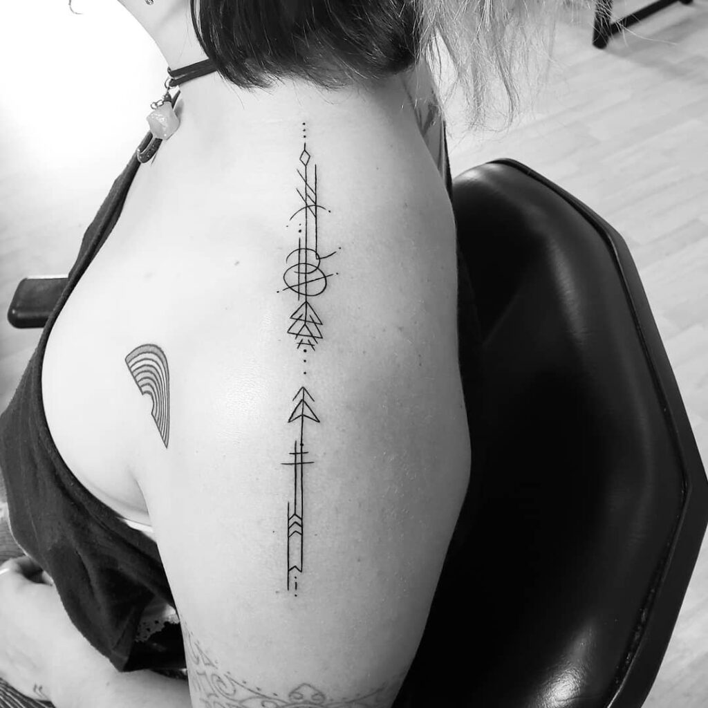 Spine Arrow with Norse runes  Cover up tattoos Arrow tattoo Cover up  tattoo