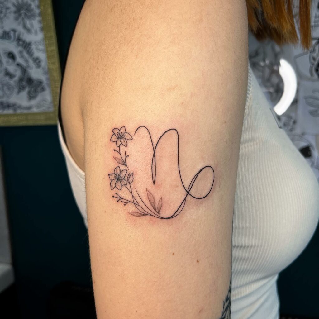 Girly Capricorn Symbol Tattoo