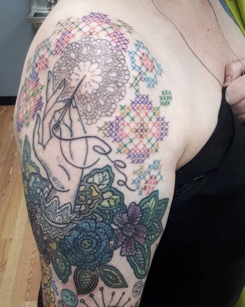 Gorgeous Cross Stitch Tattoo Idea With A Needle