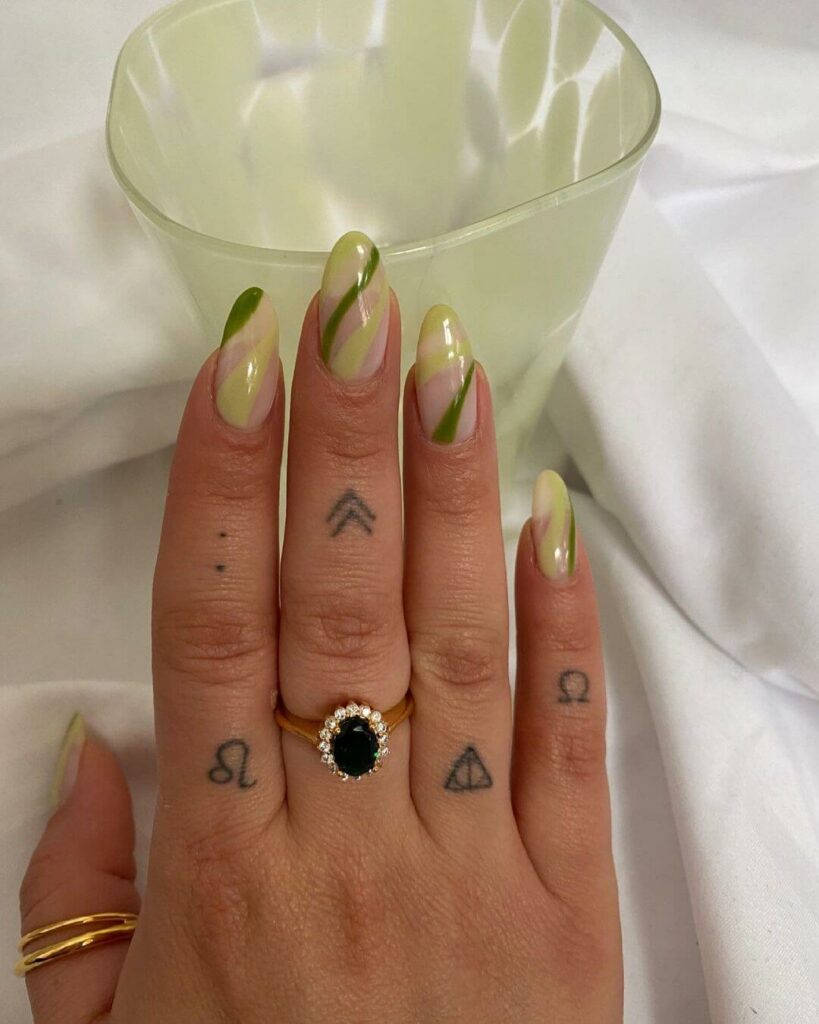 Greek Initial Tattoo on Finger