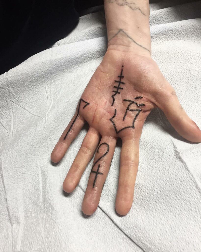 Grimes Palm Tattoo