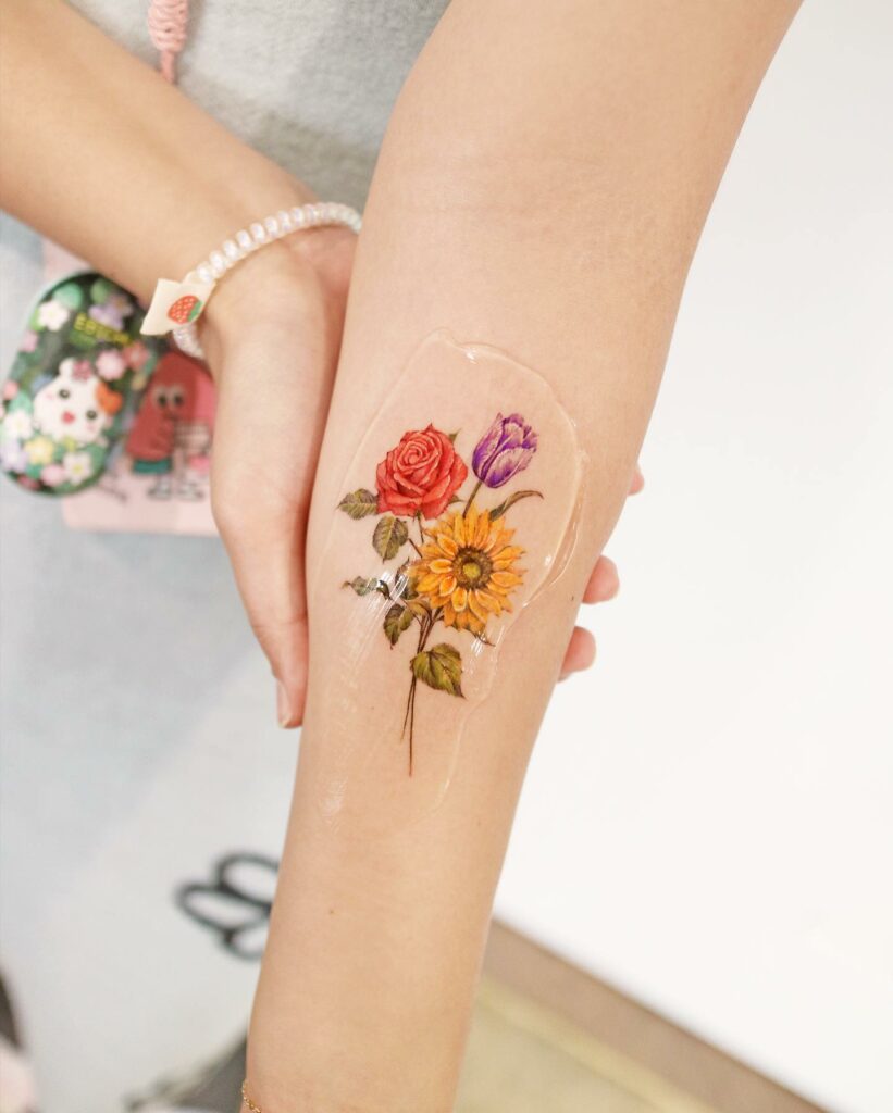 Share 154+ sunflower bouquet tattoo super hot