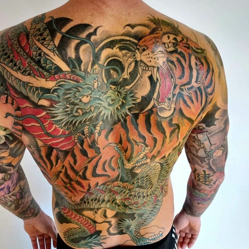 Japanese Dragon And Tiger Full Back Tattoo