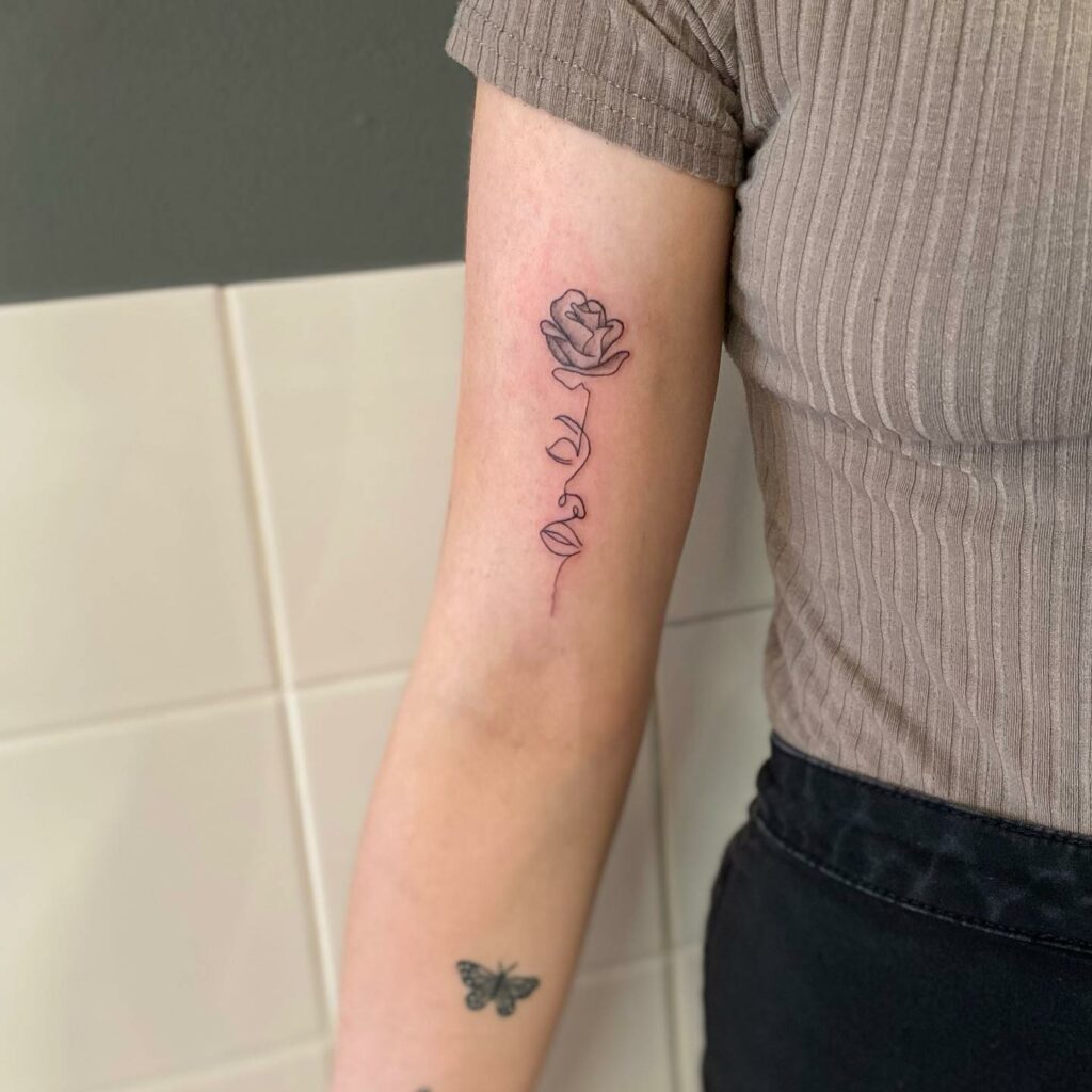 Line Art Rose With Stem Tattoo