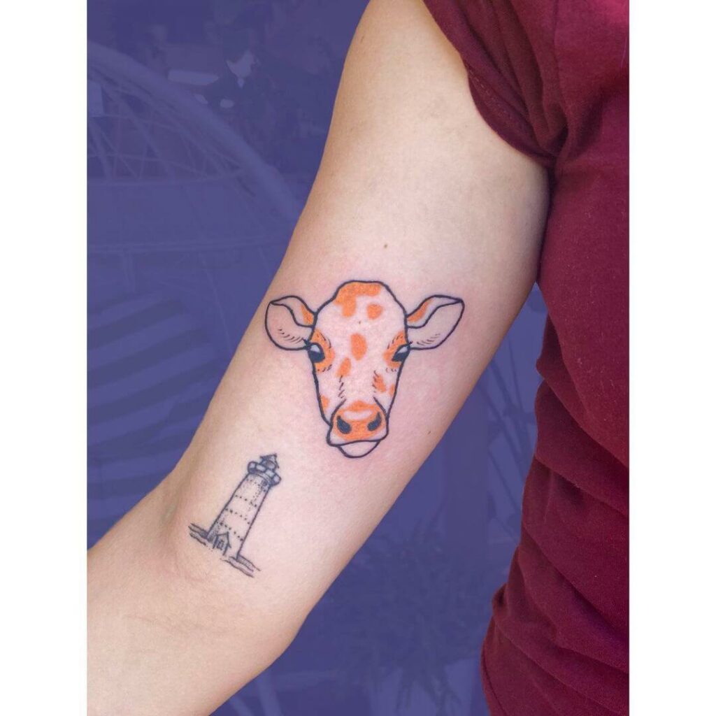 Little Orange Cow Tattoo