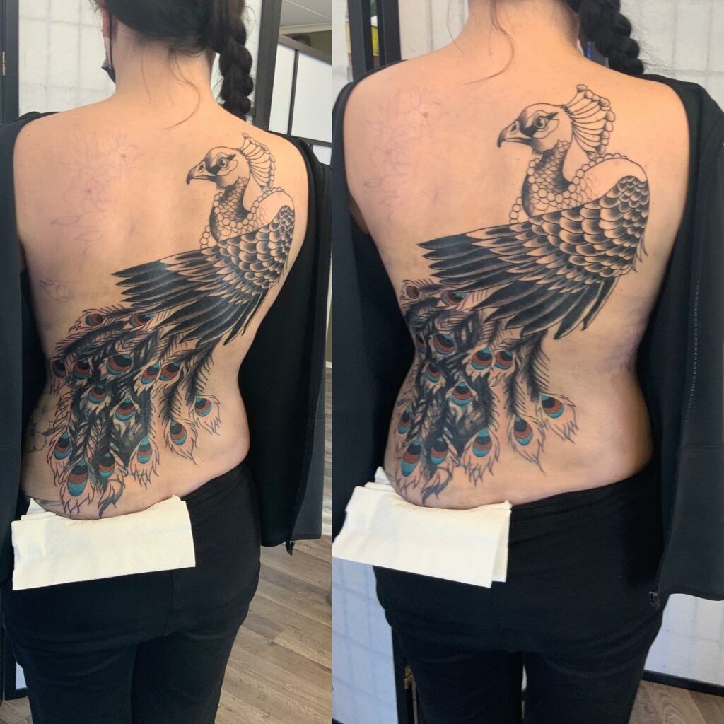 Magistic Peacock Tattoo On Back