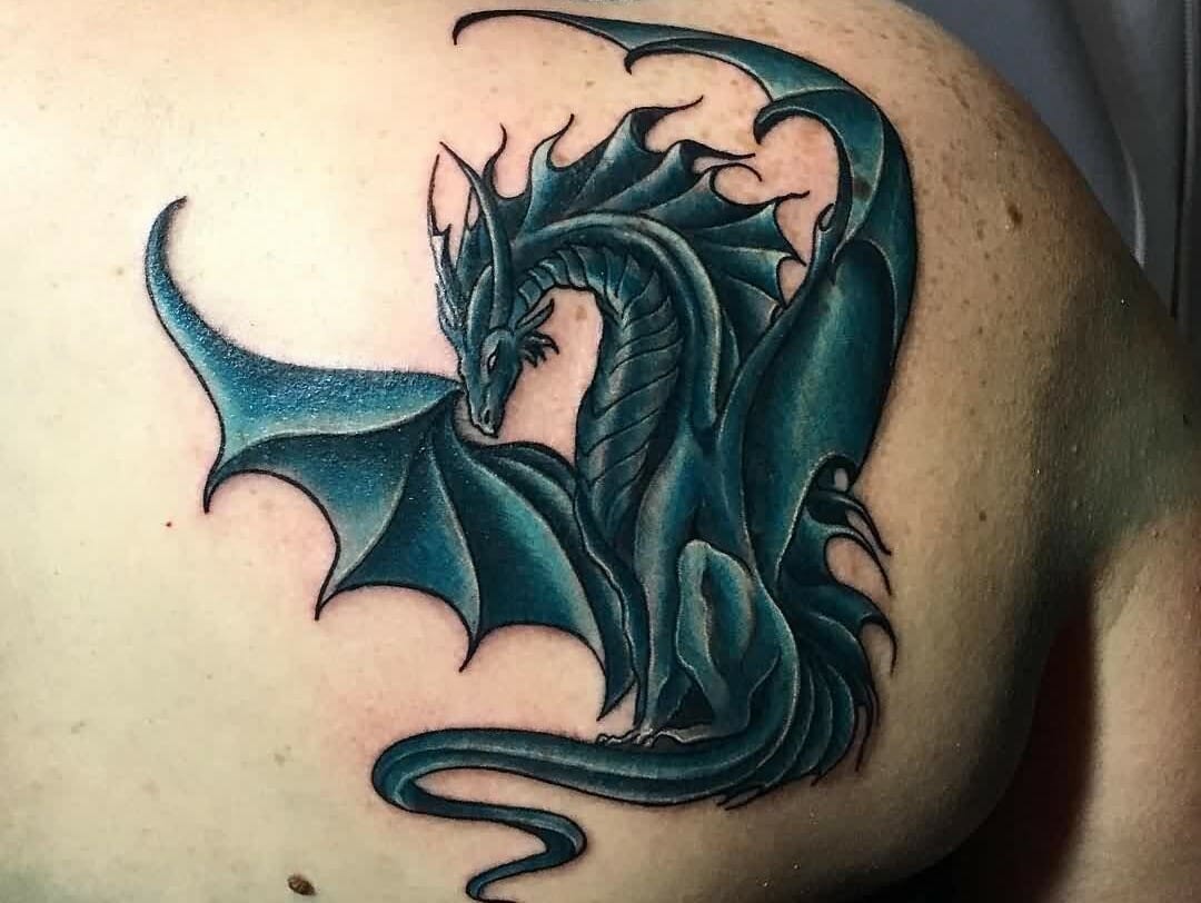 Grey Ink Dragon Head Tattoo On Left Back Shoulder