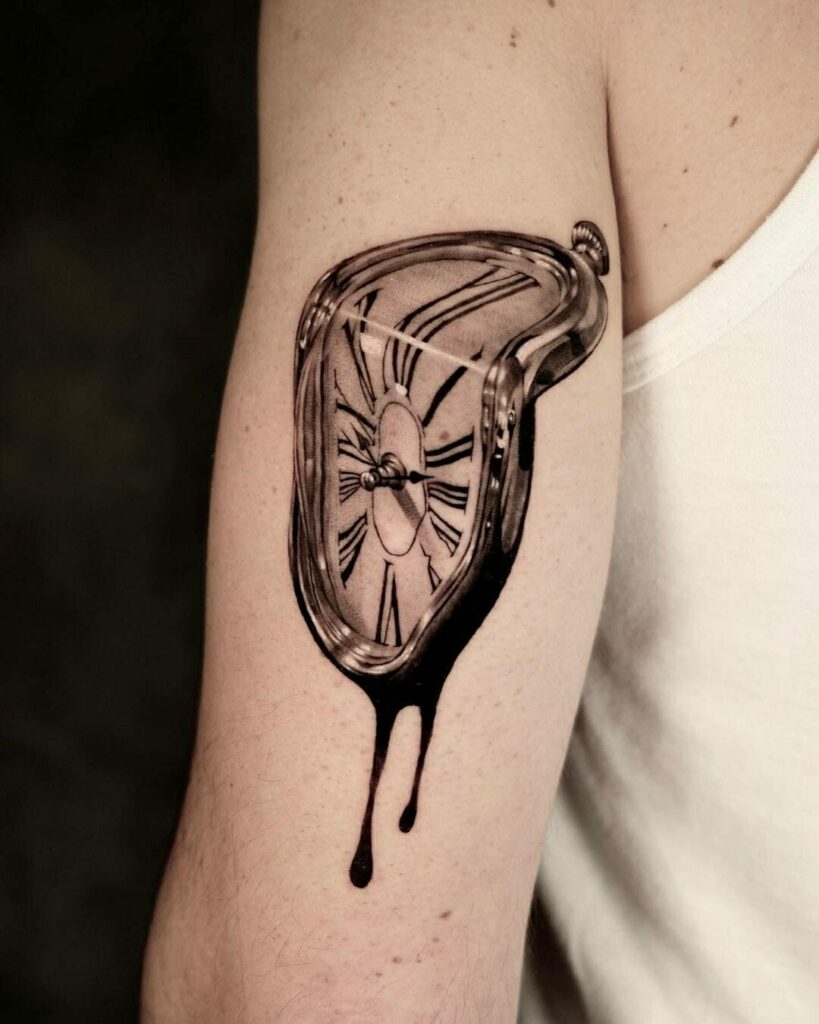 Graphic style clock tattoo above the ankle.