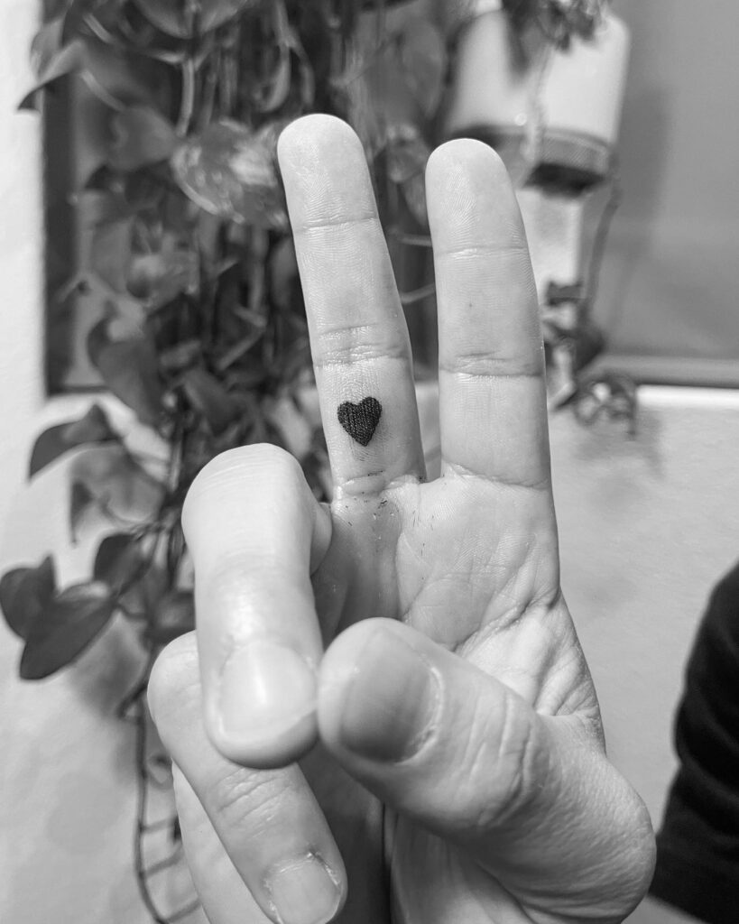 Middle Finger Heart Tattoos