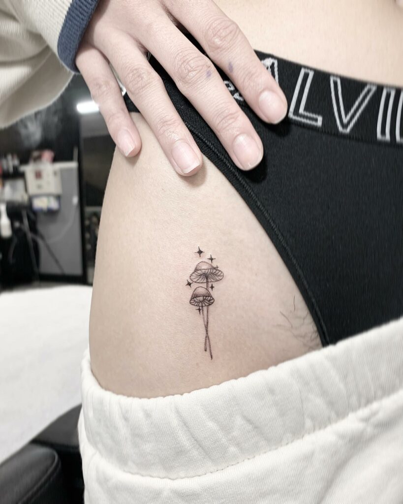 Minimalist Mushroom Hip Tattoo