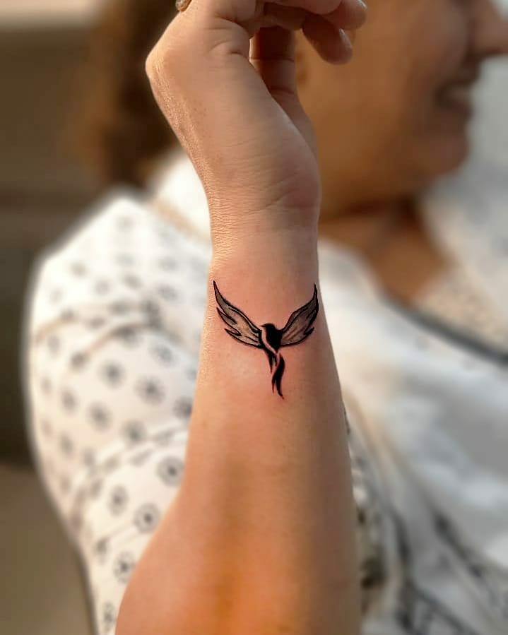 Minimalist Phoenix Tattoo