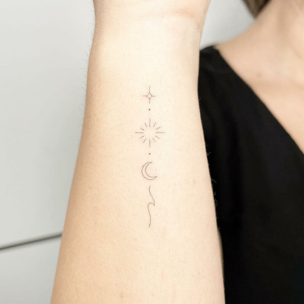 Minimalist Sun Moon Star Tattoo