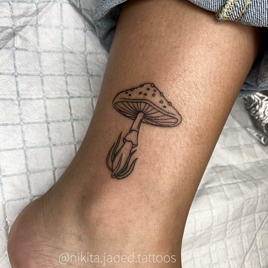 Goopy mutant mushroom tattoo by Hannah at Drawn and Quartered UK  r tattoo