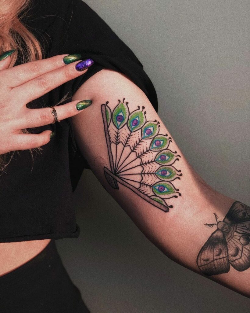 Oriental Fan Shaped Peacock Tattoo Idea