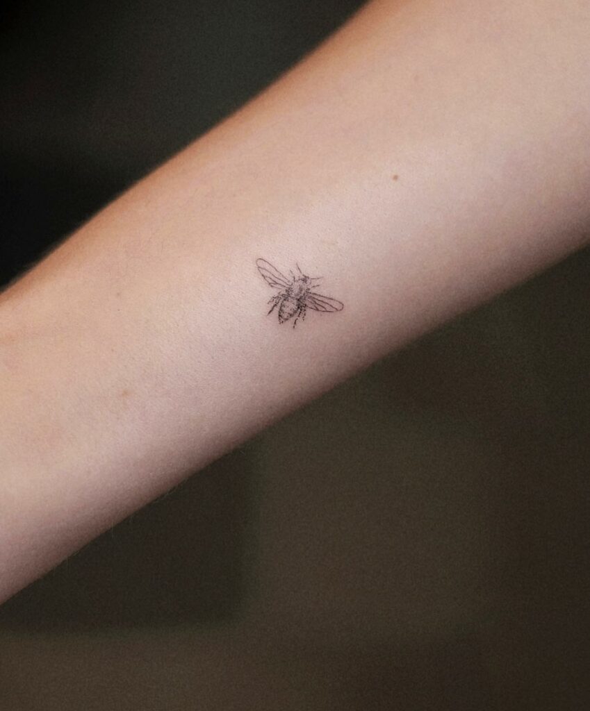 Outlined Tiny Bee Tattoo