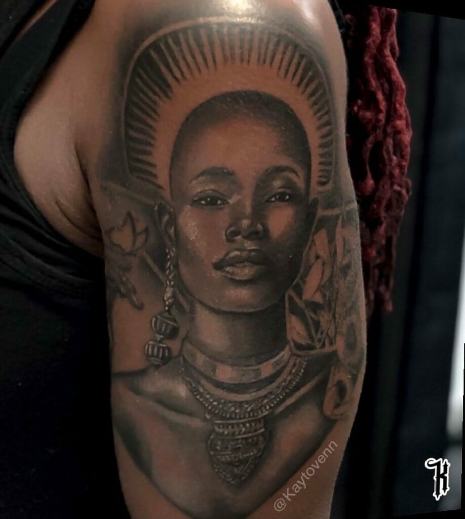 African Queen In Map Tattoo On Thigh