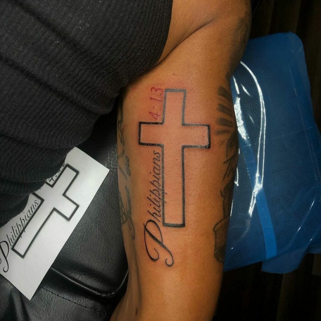 Philippians 413 lettering tattoo located on the