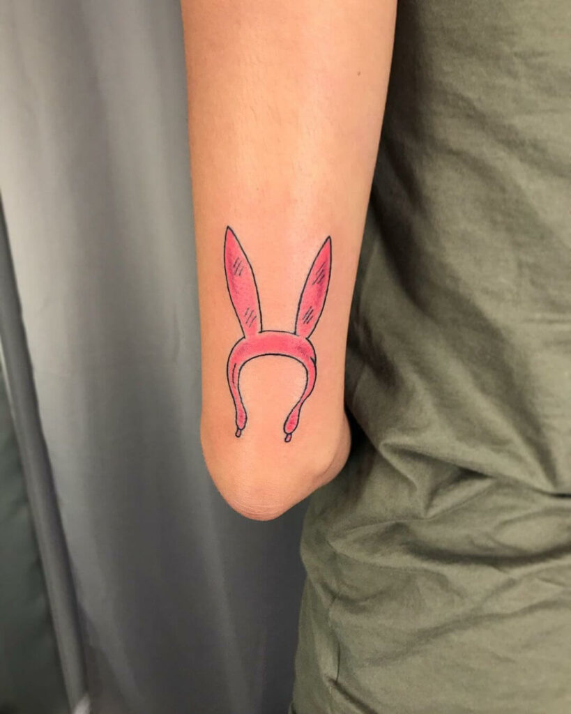 Pink Bunny Ears Arm Tattoo