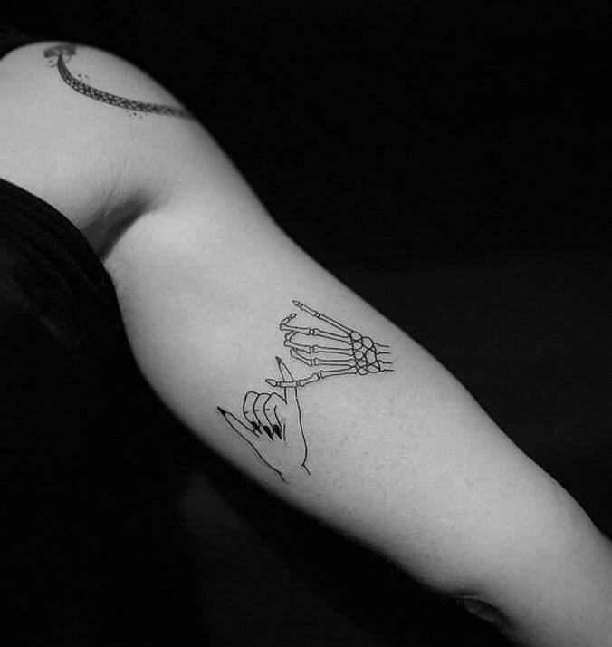 Quirky Skeleton Hand Tattoos