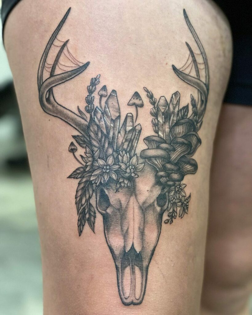 Realistic Longhorn Tattoo With The Head Adorned