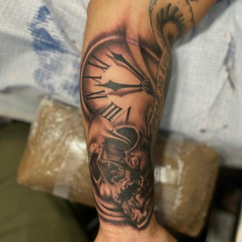 Realistic Skeleton Clock Hand Tattoo