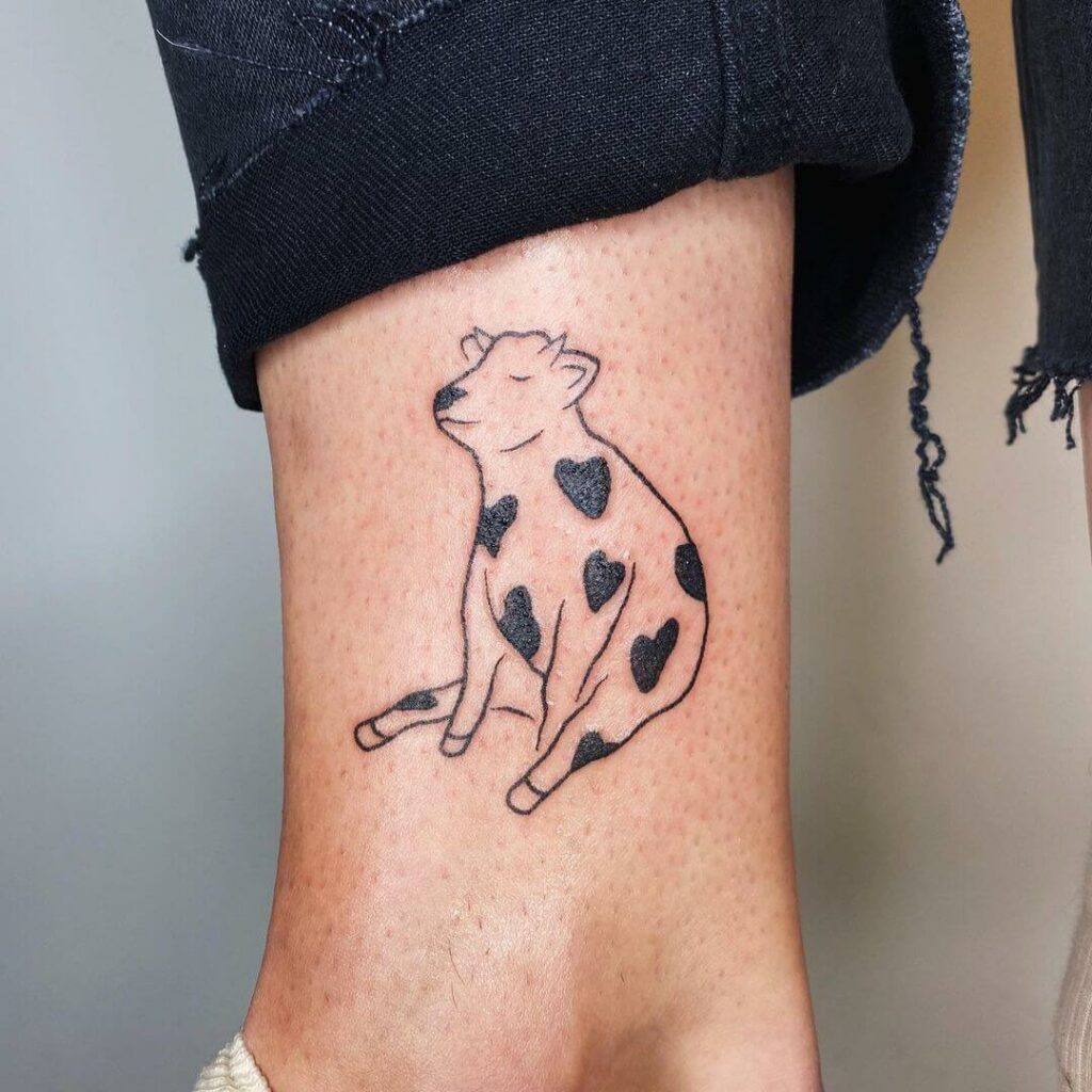 Relaxing Cow Tattoo