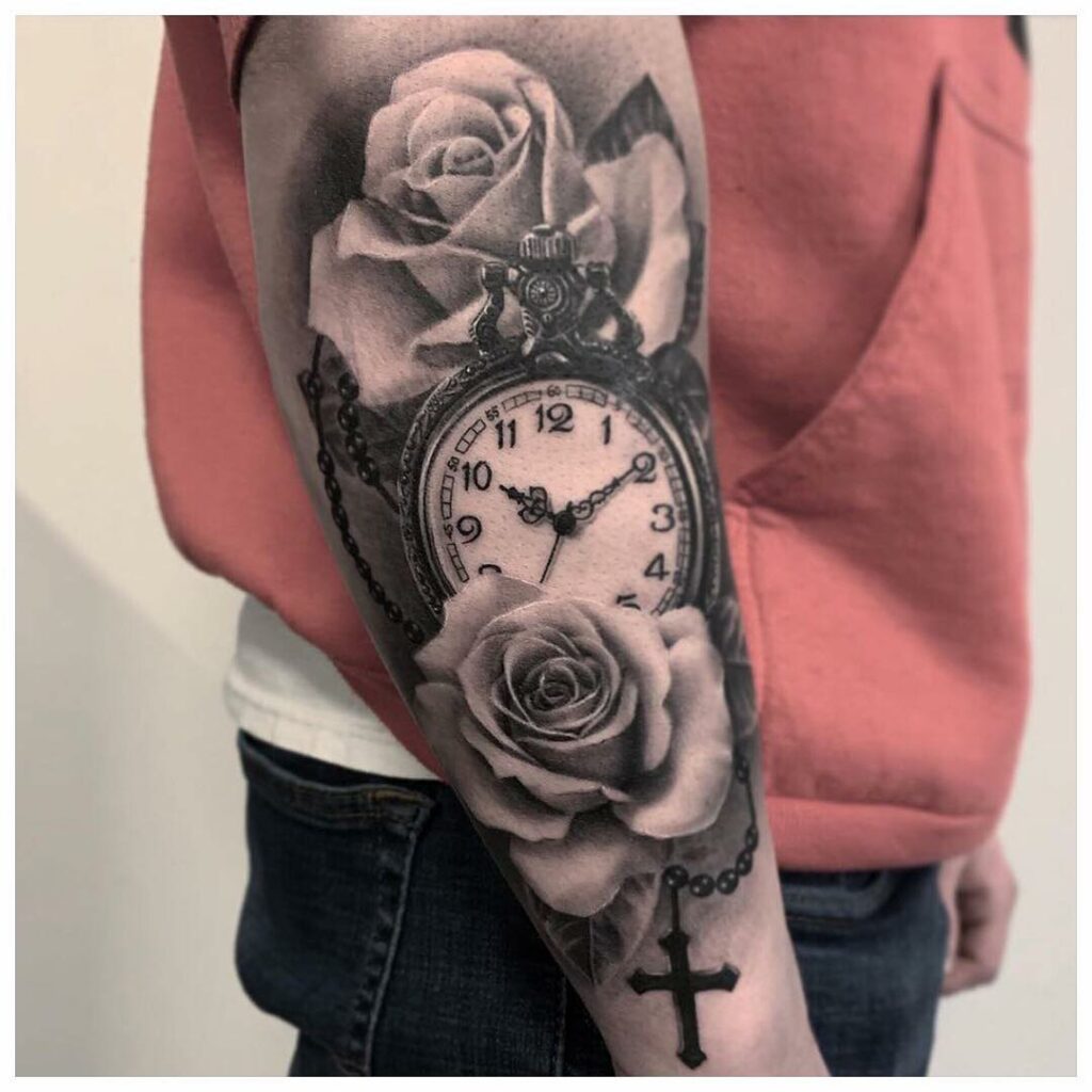 Rose And Pocket Watch Rosary Tattoo On Arm