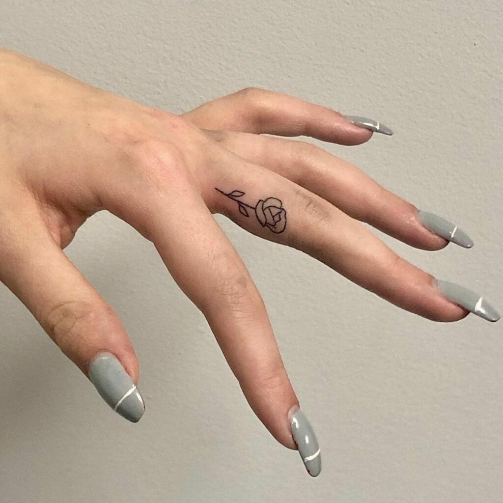 Rose Finger Tattoo