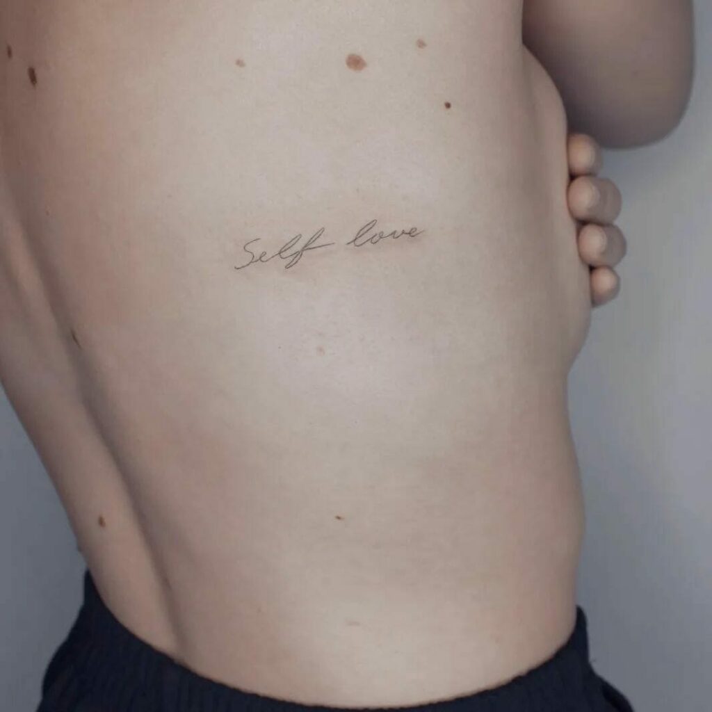 Live in love chest tattoo