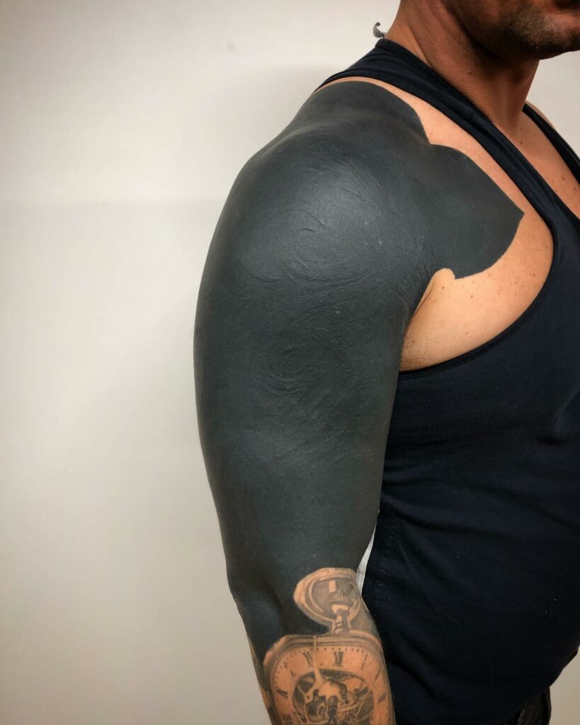 Shoulder To Upper Arm Blackout Tattoo