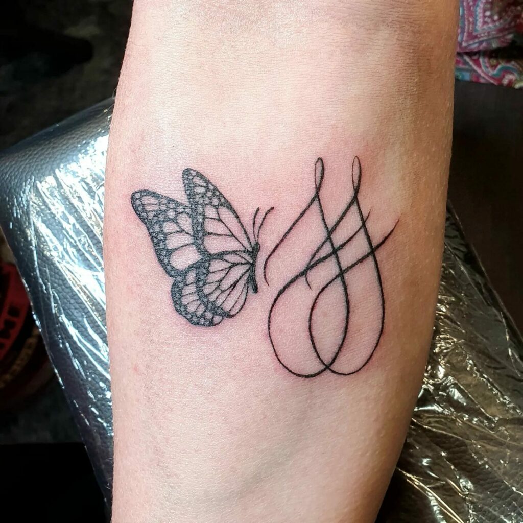 Simple Butterfly Tattoo With Initials Of A Name
