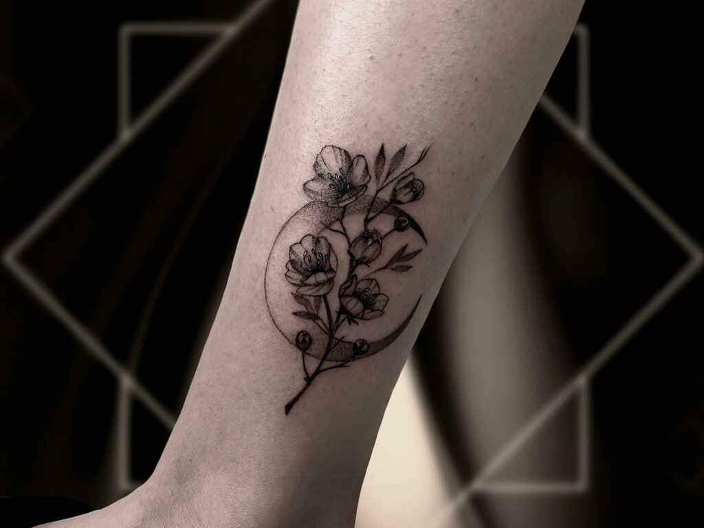 Simple Moon Tattoo With Flowers