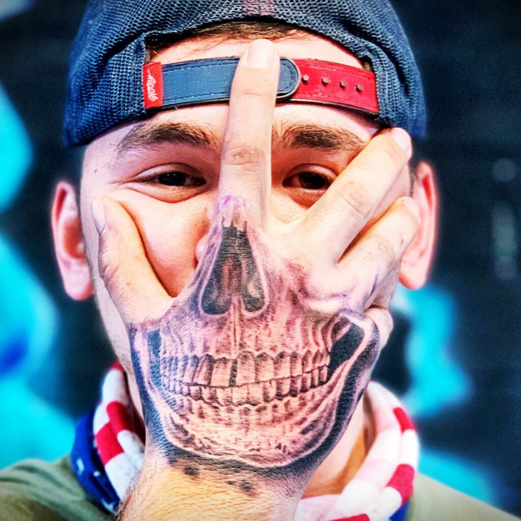 Skeleton Face Hand Tattoo