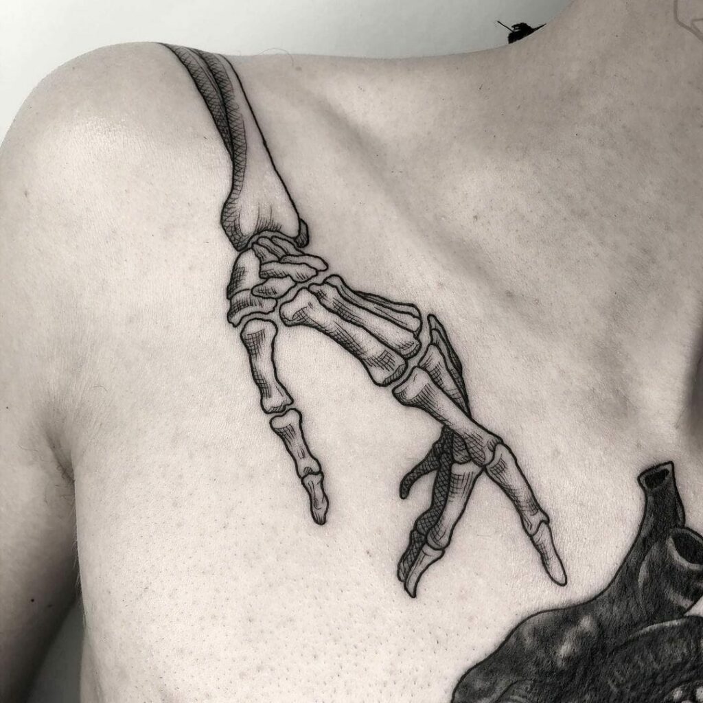 Skeleton Hand Tattoo With A Snake