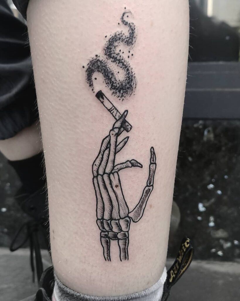 Skeleton Hand with cigarette Tattoo